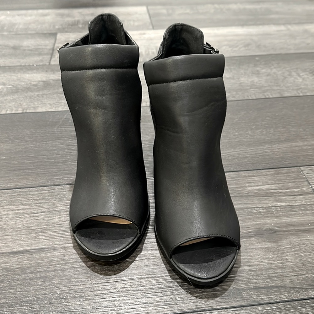 Black Soda Booties with open toe. Size 8.5.